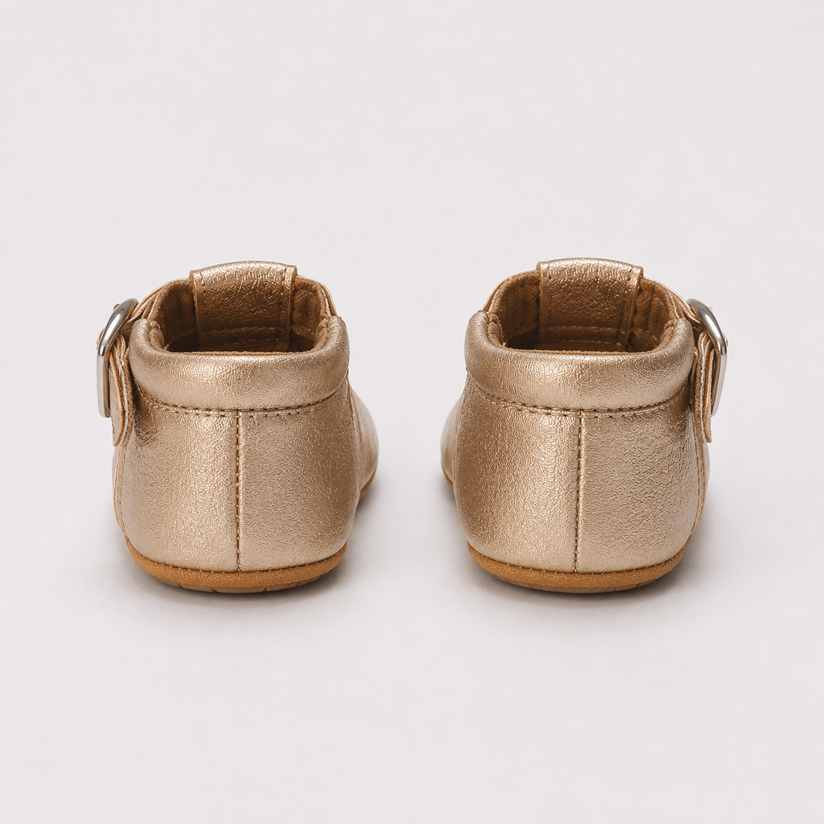 Chaussures premiers pas bébé fille dorées à bride en T