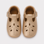 Chaussures premiers pas bébé fille dorées à bride en T