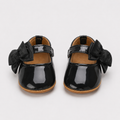 Chaussures premiers pas bébé fille noires en cuir PU à nœud