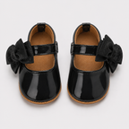Chaussures premiers pas bébé fille noires en cuir PU à nœud