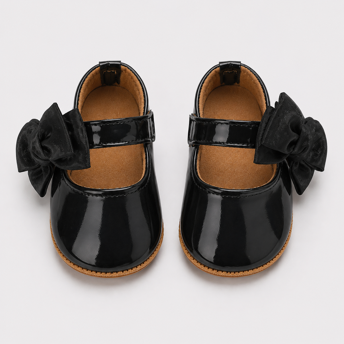 Chaussures premiers pas bébé fille noires en cuir PU à nœud