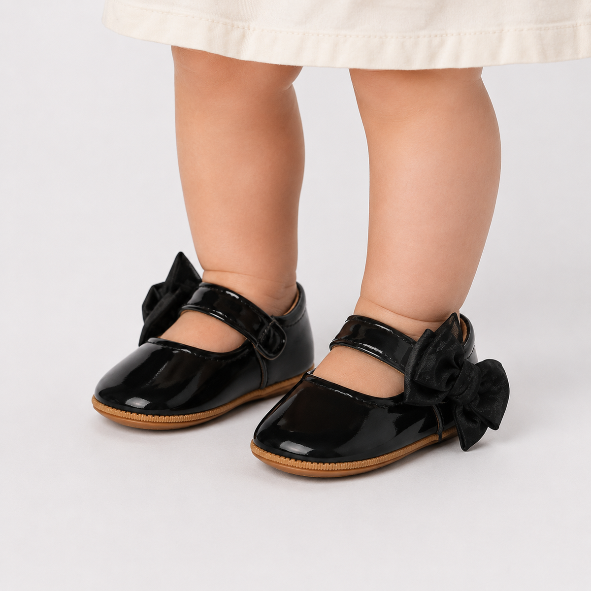 Chaussures premiers pas bébé fille noires en cuir PU à nœud