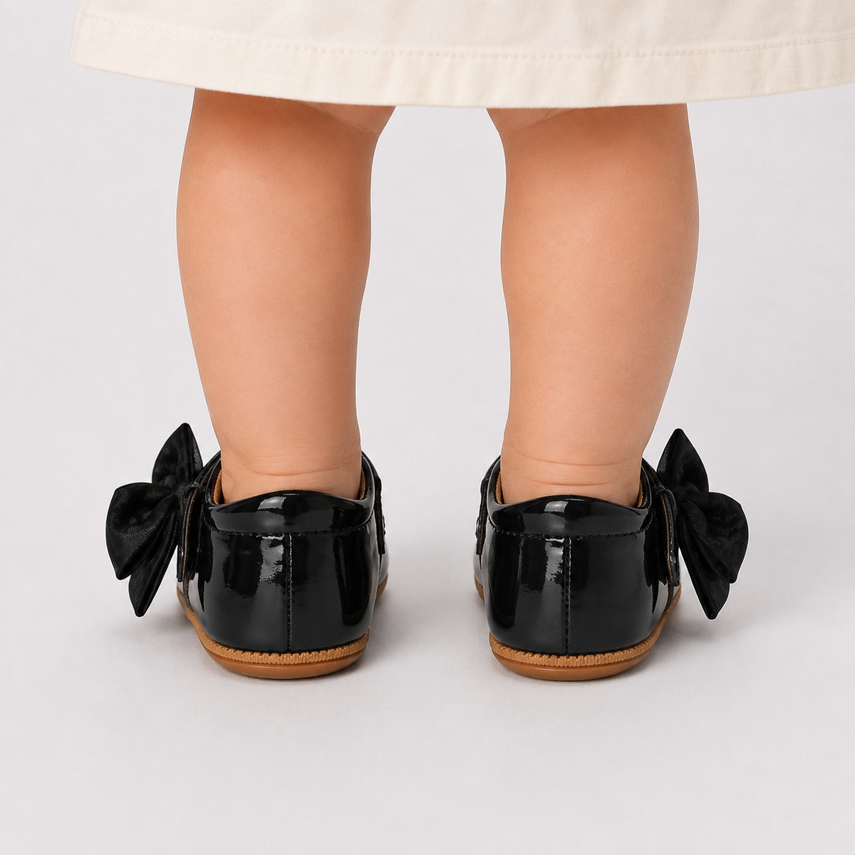 Chaussures premiers pas bébé fille noires en cuir PU à nœud