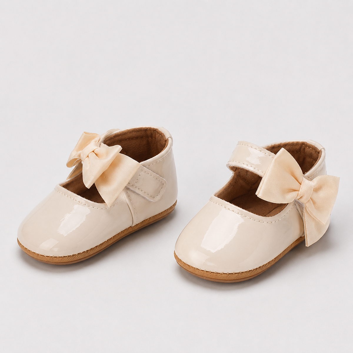 Chaussures premiers pas bébé fille crème à nœud en cuir PU