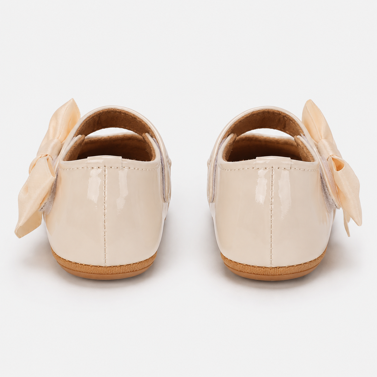 Chaussures premiers pas bébé fille crème à nœud en cuir PU