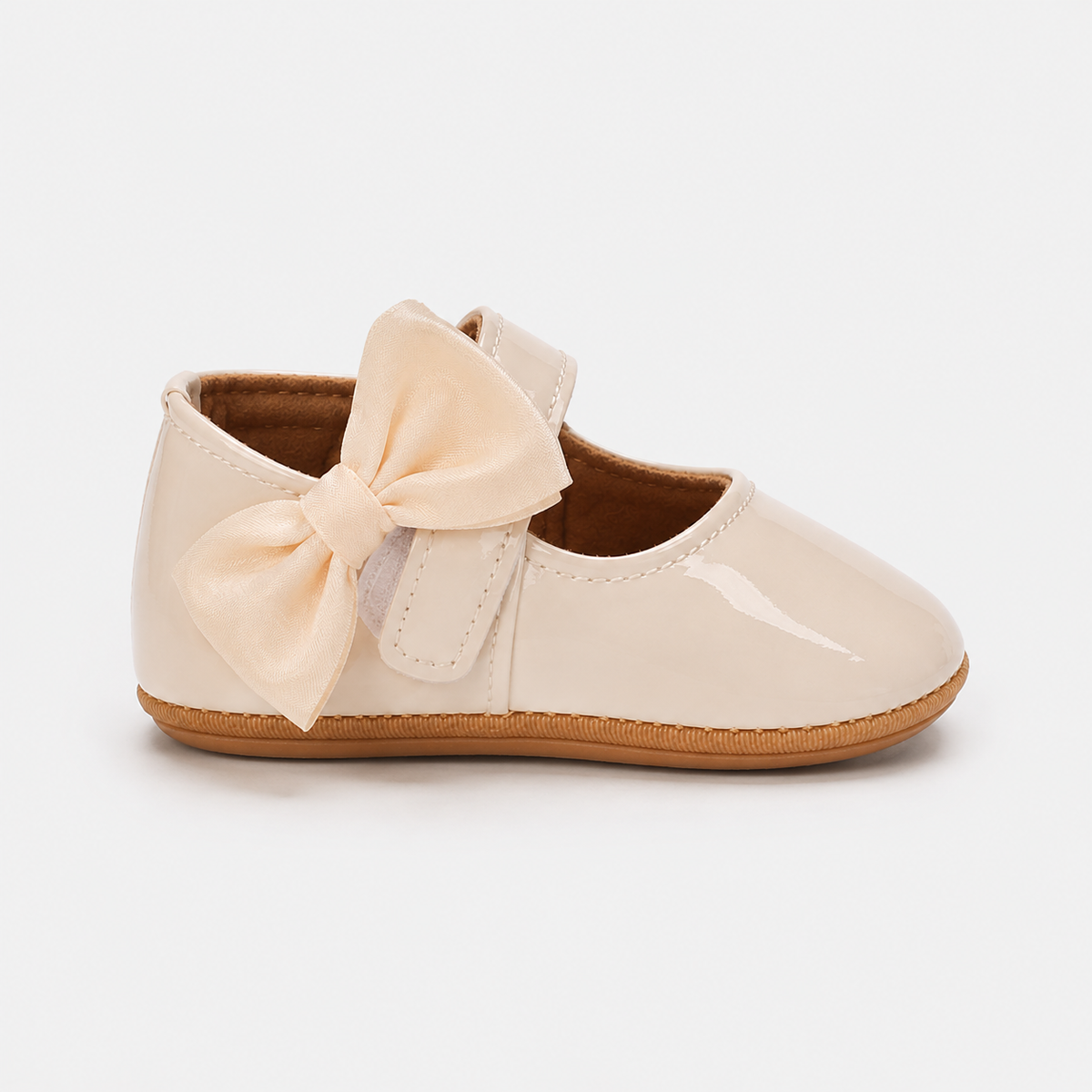 Chaussures premiers pas bébé fille crème à nœud en cuir PU