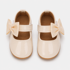 Chaussures premiers pas bébé fille crème à nœud en cuir PU