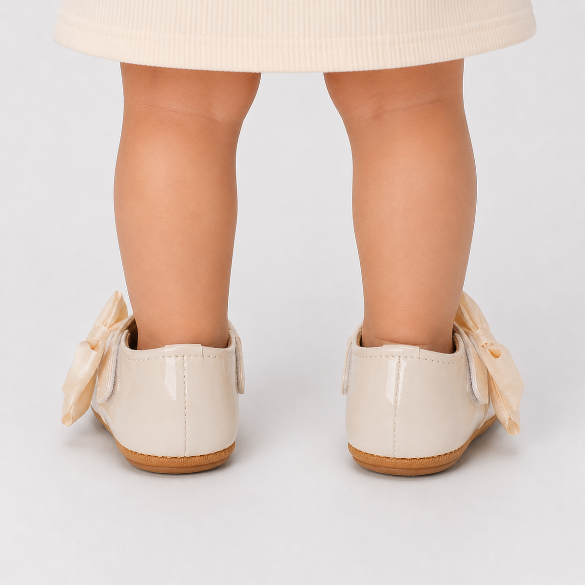Chaussures premiers pas bébé fille crème à nœud en cuir PU