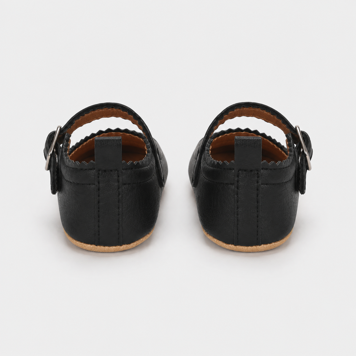 Chaussures premiers pas bébé fille noires en PU à bride boucle