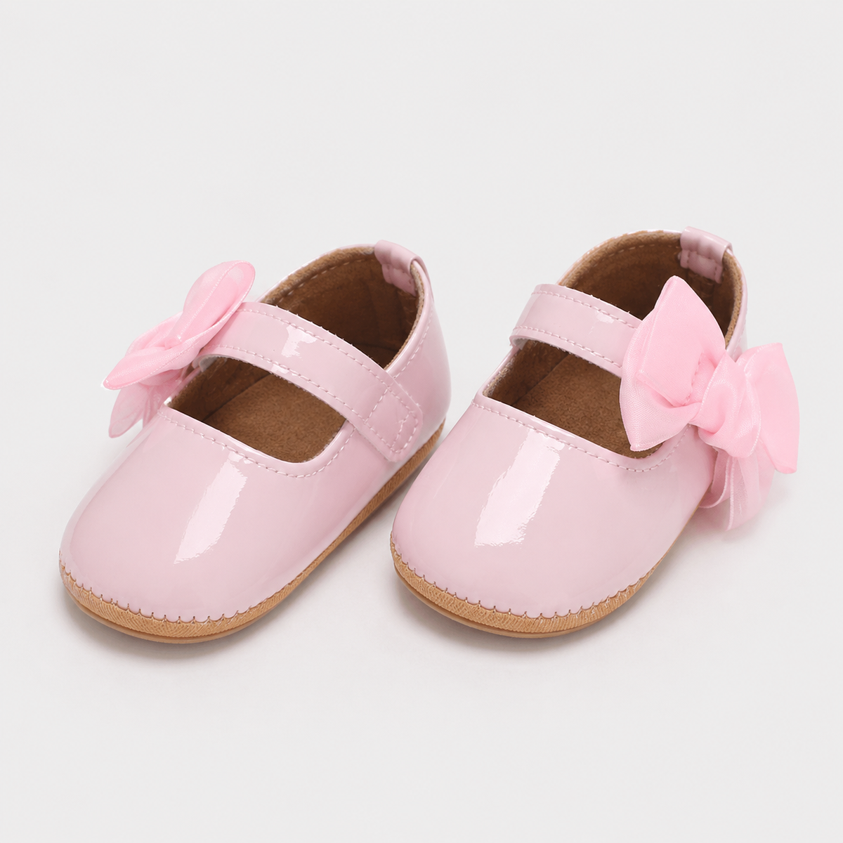 Chaussures premiers pas bébé fille roses à nœud en cuir PU