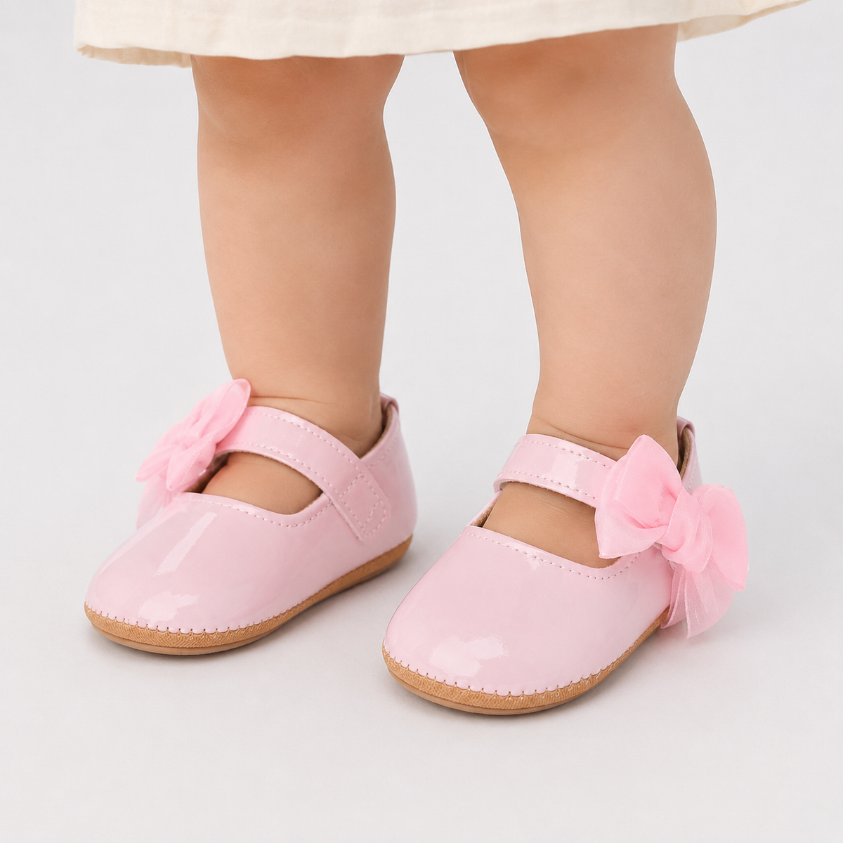 Chaussures premiers pas bébé fille roses à nœud en cuir PU