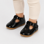 Premières chaussures bébé fille noires en cuir PU verni à scratch