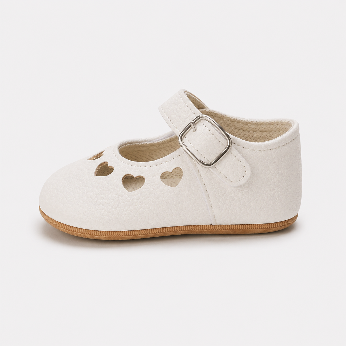 Chaussures premiers pas bébé filles blanches à cœurs ajourés