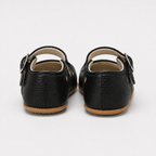 Chaussures premiers pas bébé fille noires en similicuir PU à bride