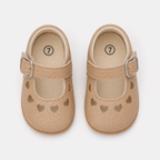 Chaussures premiers pas bébé fille beige en PU à cœurs ajourés