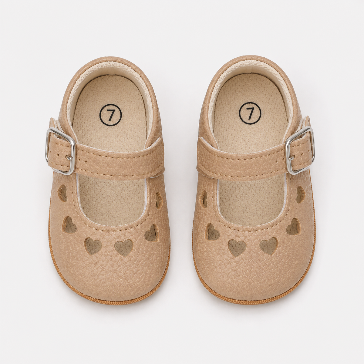 Chaussures premiers pas bébé fille beige en PU à cœurs ajourés