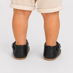 Chaussures premiers pas bébé noires à bride boucle, semelle antidérapante
