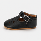 Chaussures premiers pas bébé noires à bride boucle, semelle antidérapante