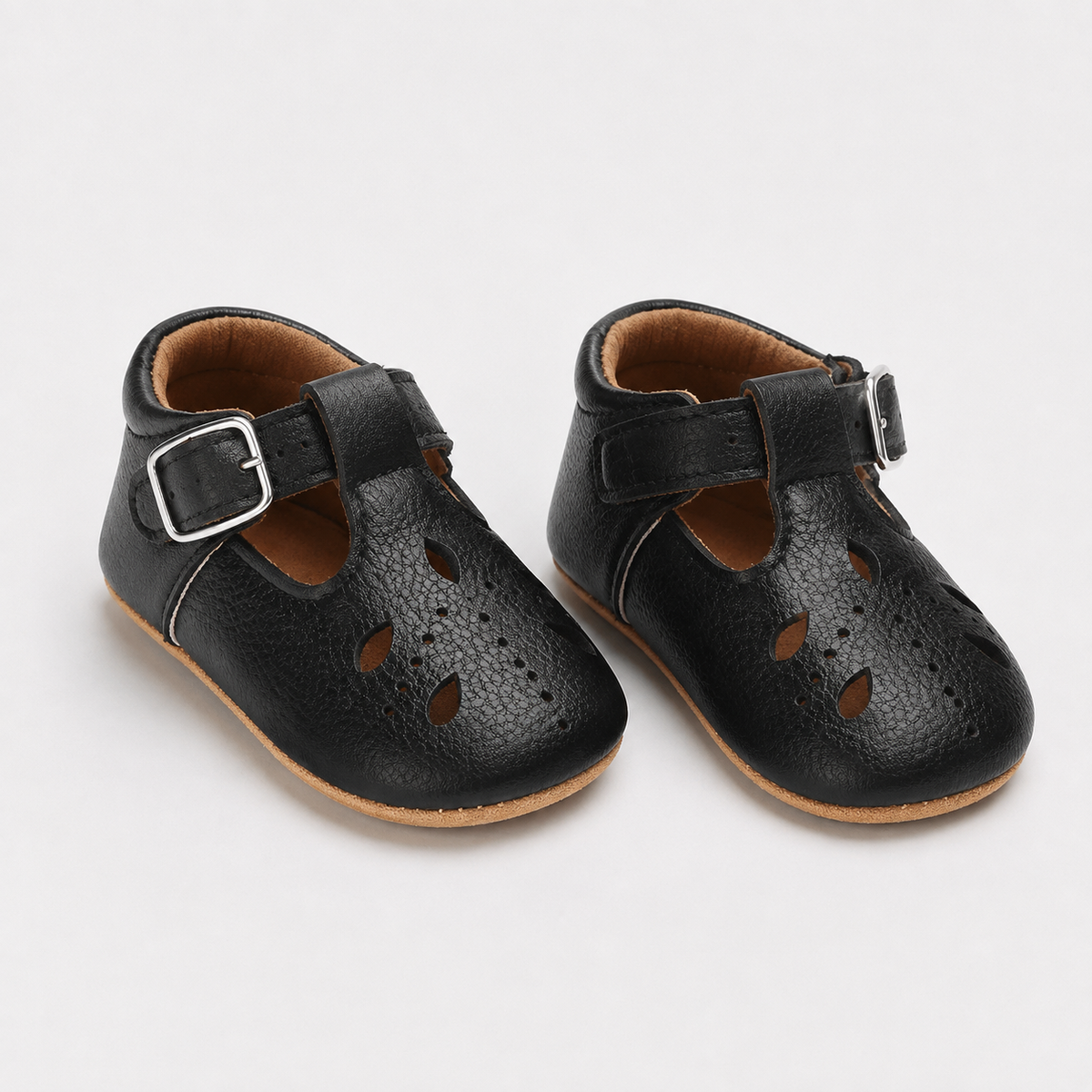 Chaussures premiers pas bébé noires à bride boucle, semelle antidérapante