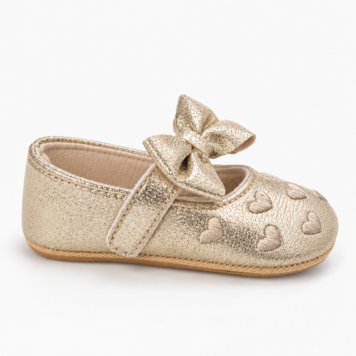 Chaussures premiers pas bébé fille dorées à nœud et cœurs brodés