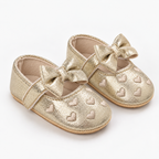 Chaussures premiers pas bébé fille dorées à nœud et cœurs brodés