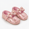 Chaussures de premier pas bébé fille rose pailleté à cœurs avec nœud