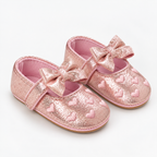 Chaussures de premier pas bébé fille rose pailleté à cœurs avec nœud