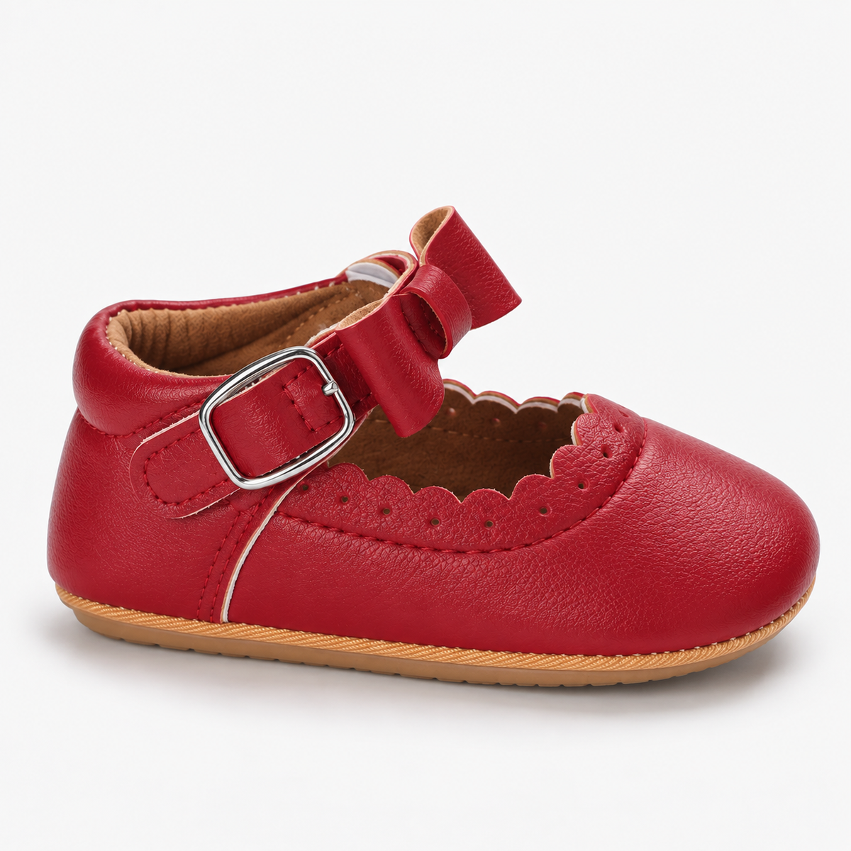 Chaussures premiers pas bébé fille rouges à nœud festonné