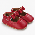 Chaussures premiers pas bébé fille rouges à nœud festonné